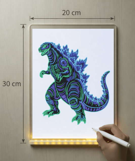 Light pad with a dinosaur illustration and dimensions on a wooden surface