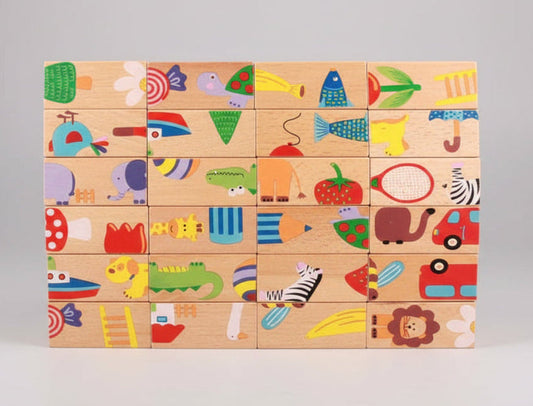 Set of wooden blocks with colorful animal and object illustrations on a light gray background