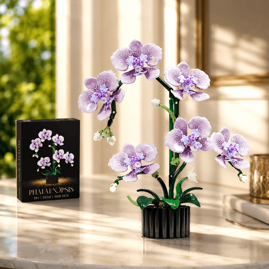 Phalaenopsis Orchid Building Set box beside the built purple-spotted orchid model