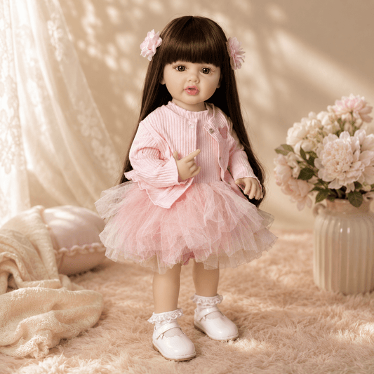 Doll in a pink dress with flowers in hair
