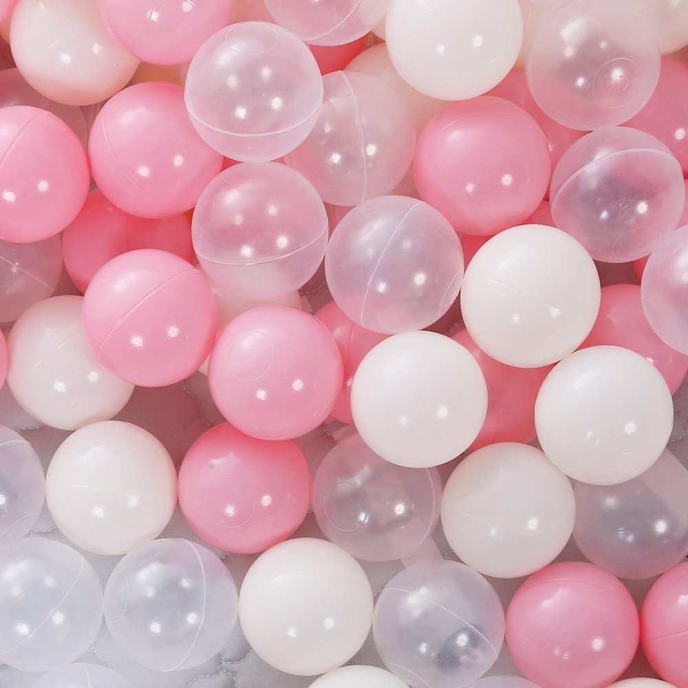 Close-up of pink, white, and clear plastic balls.