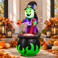 6 FT witch cauldron bubbling potion Halloween inflatable on a porch during the day