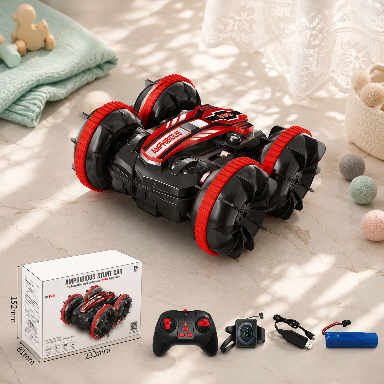 Amphibious stunt car with remote control, battery, and accessories on a light surface, boys spacial awareness development toy