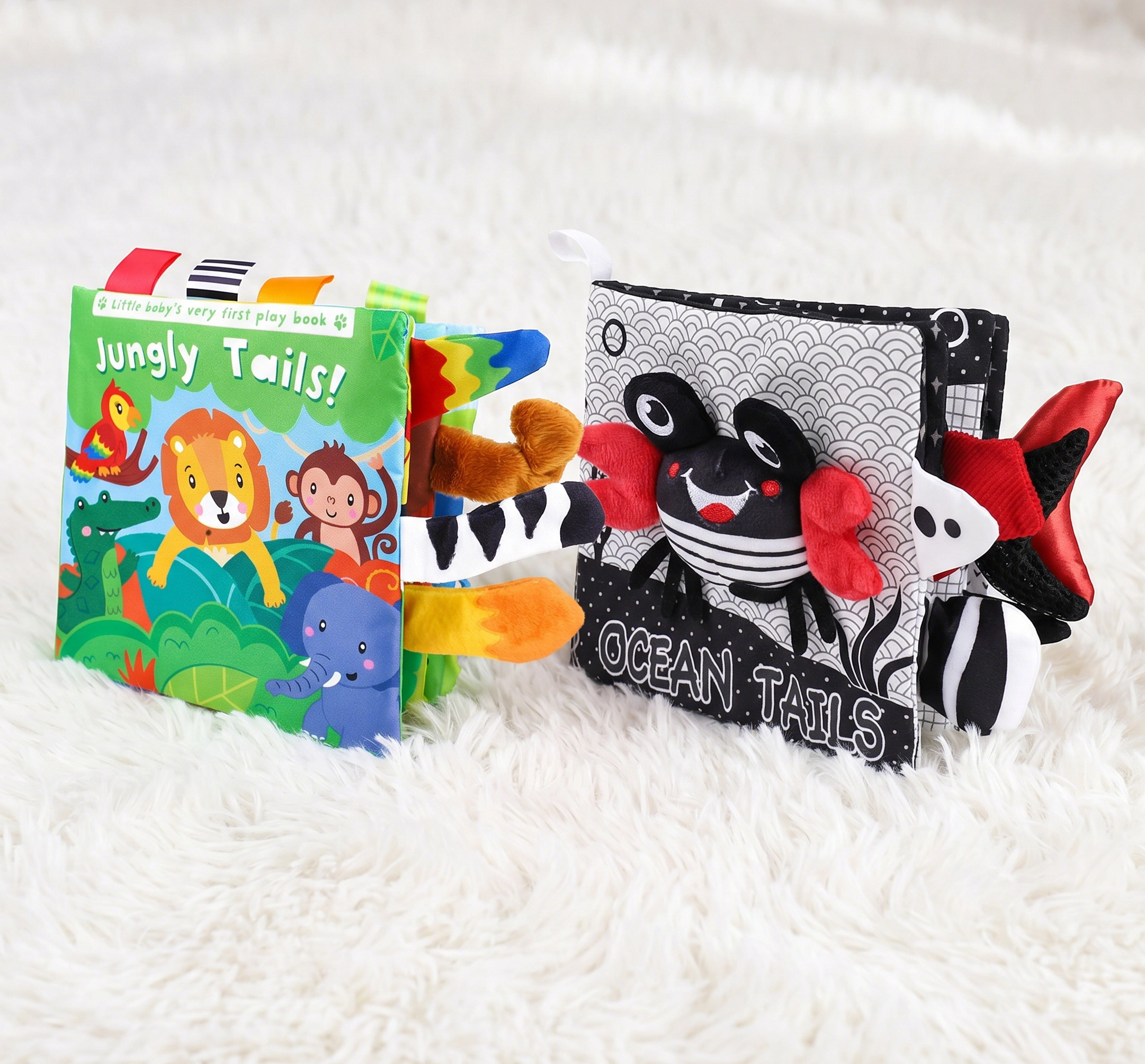 Children's book titled 'Jungle Tails' with a matching soft toy and 'Ocean Tails' toy on a white background