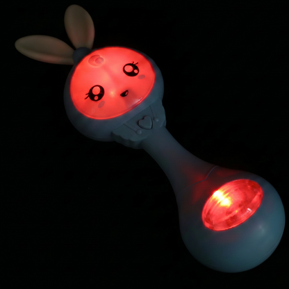 Toy rattle with red lights on a black background,Baby Musical Rattle with Flashing Lights & Teether | 6 Music Modes Bunny Sensory Toy | Newborn Sound & Light Rattle | Baby Shower Gift Ages 0–12M | BUBINNA BunnyBeat