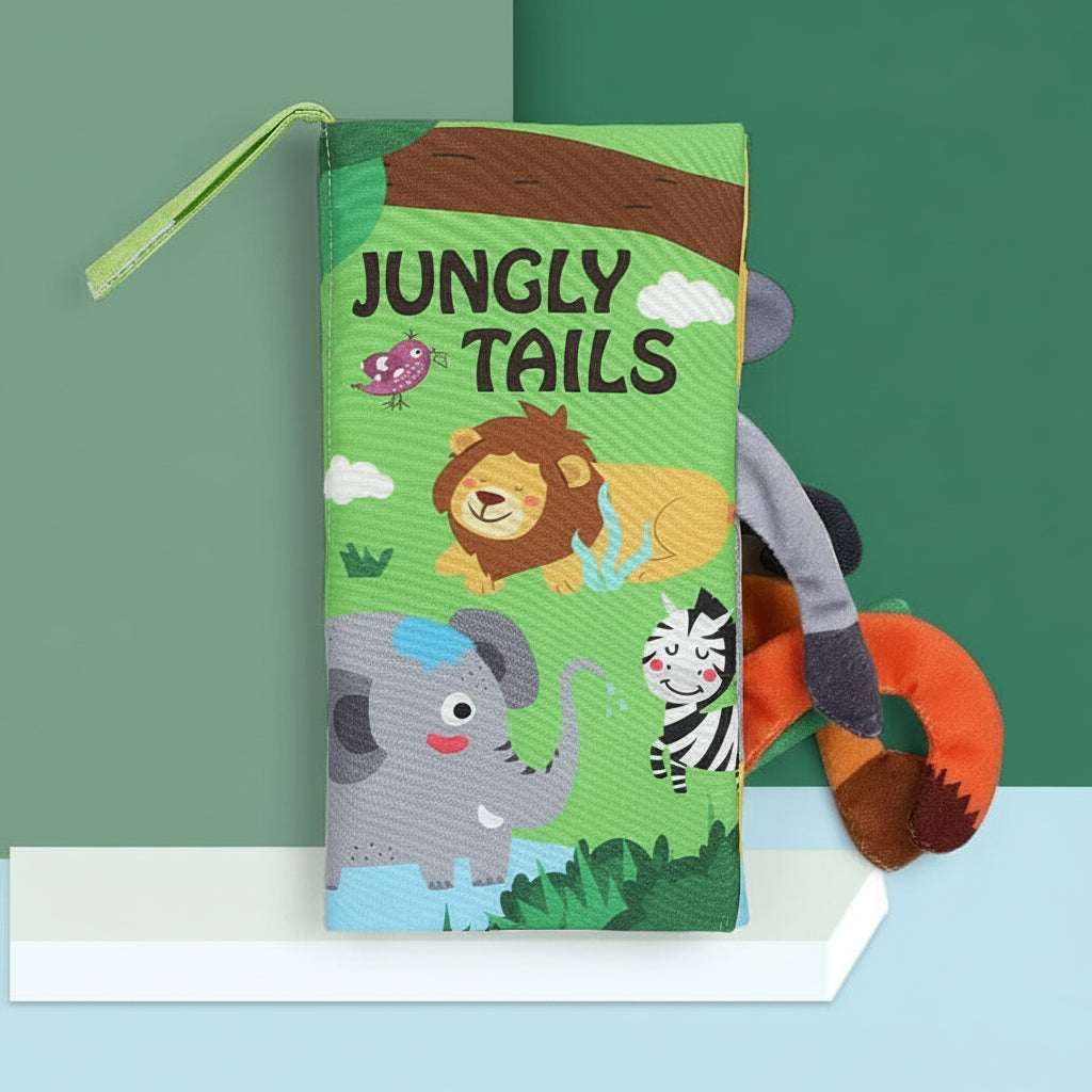 Children's  soft book titled 'Jungly Tails' with animal illustrations on a green background