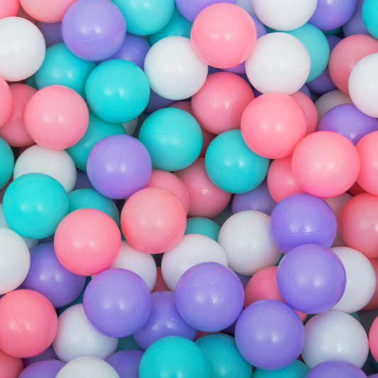 Multicolored plastic balls including pink, blue, purple, and white.
