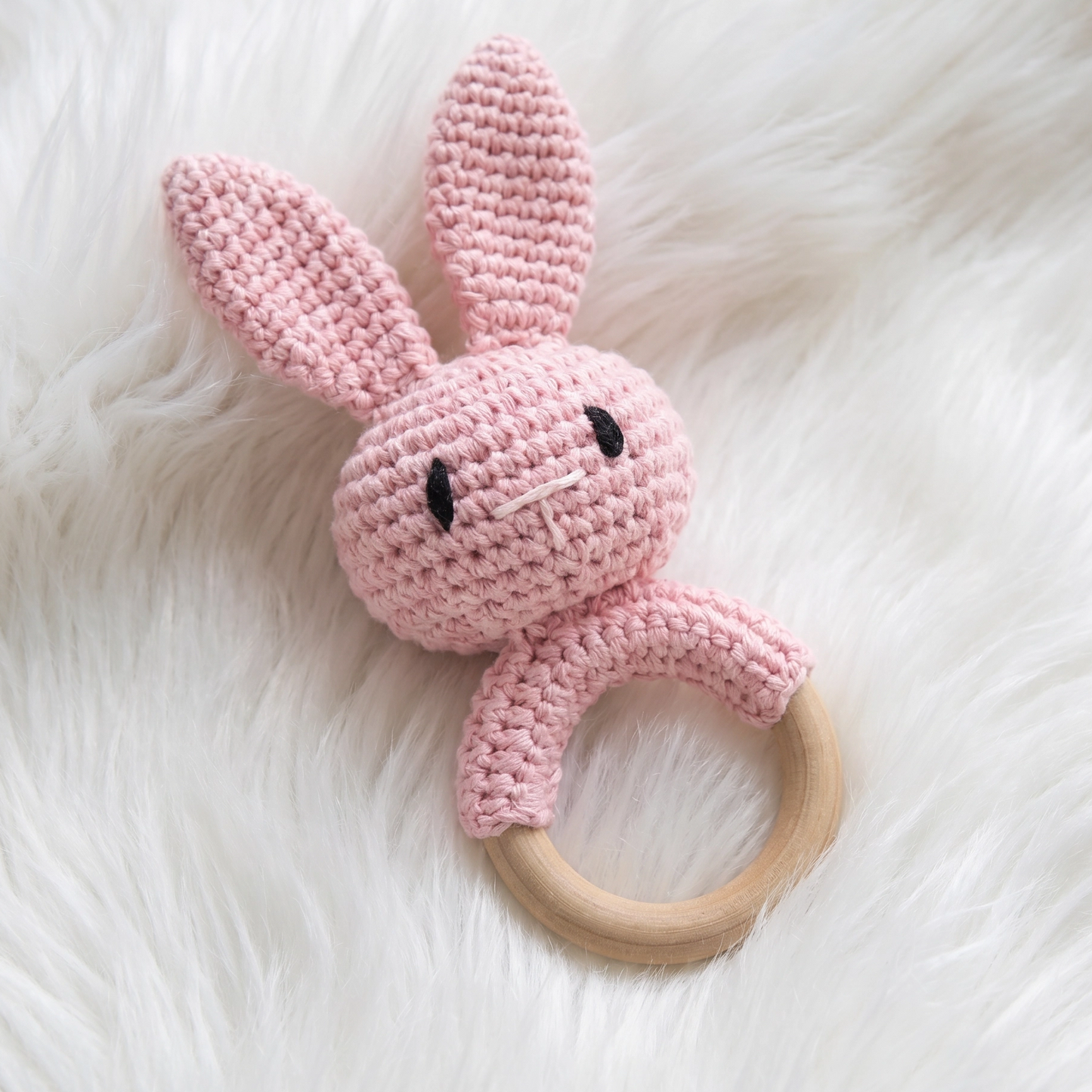 CrochetBun is one of the few baby rattles that functions simultaneously as a sensory developmental toy, a teether, a nursery decorative object and a keepsake. 
