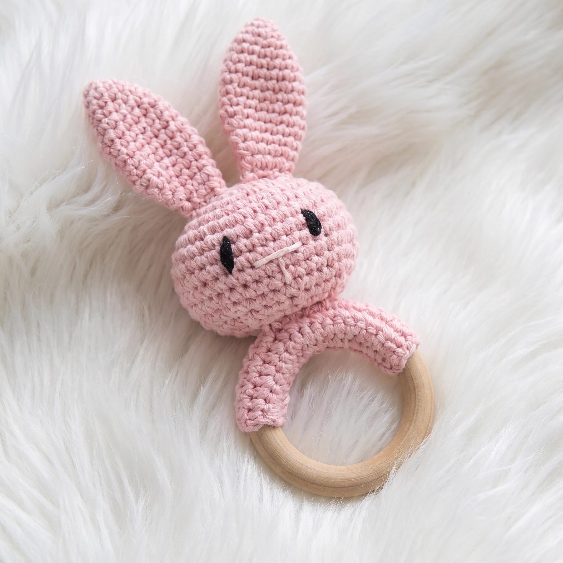 CrochetBun is one of the few baby rattles that functions simultaneously as a sensory developmental toy, a teether, a nursery decorative object and a keepsake. 