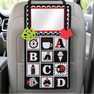 A car seat back mirror toy for babies with a mirror and alphabet blocks