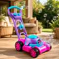 A pink and purple toy lawn mower with a blue handle and bubble blower attachment
