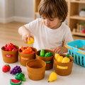 Toddler boy sorting play food by color into baskets, teaching color recognition, a birthday gift for a 2 year old boy