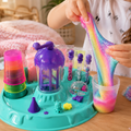 Stretchy rainbow glitter slime made with the DIY Crystal Slime Mixer Kit