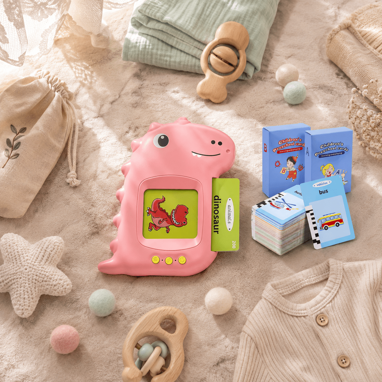Pink Dinosaur Reader talking flash card toy for toddlers, speech delay support