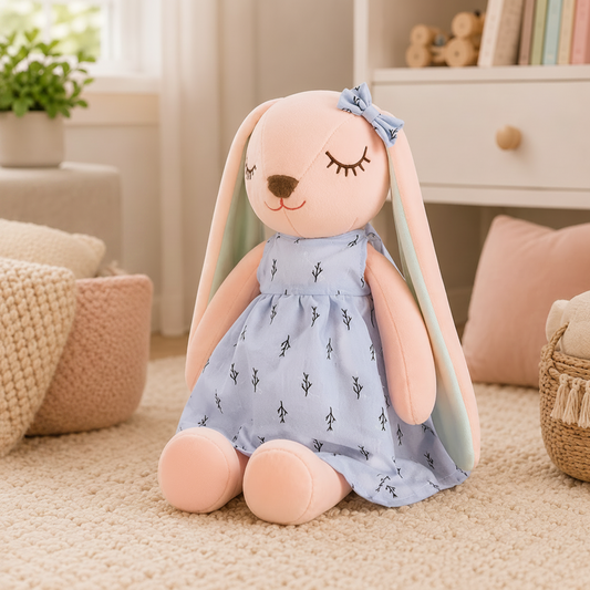 Plush toy rabbit in a blue dress 