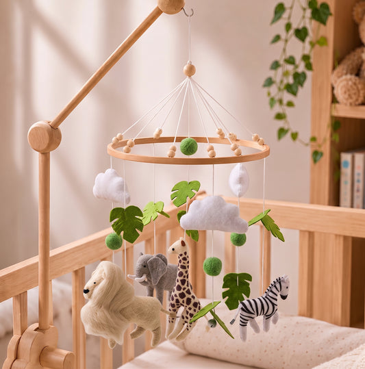 Wooden baby mobile with safari animals - lion, zebra, elephant, giraffe - on crib arm for nursery decor